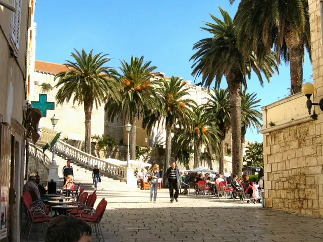 Airline Class Upgrade: Is it acceptable to travel Business Class when my partner is in Economy?...