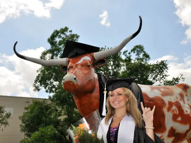 In the foreground of this image, there is a woman wearing scholarship cap and dress holding a...